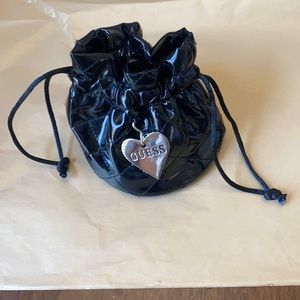 11:01  - 3/$25 Bundle Only GUESS Patent Drawstring Pouch